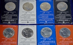 Набор из 8 сер  монет 1 доллар "Олимпиада 1984" в п/у (США)