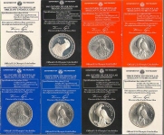 Набор из 8-и серебряных долларов "Олимпиада-84" (в п/у)
